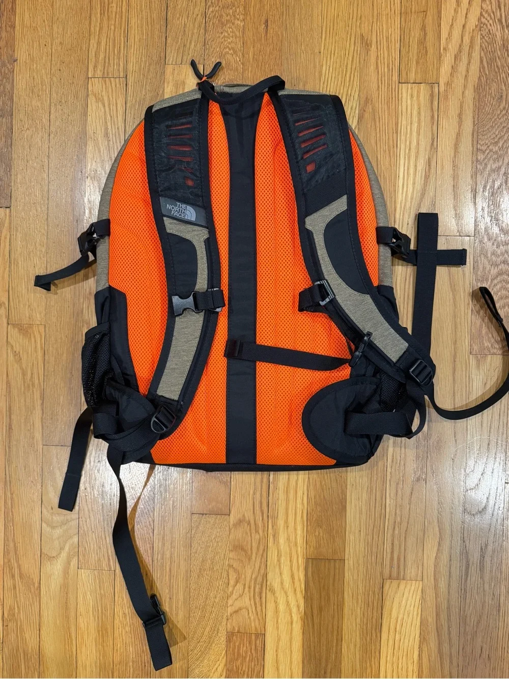 The North Face Borealis Backpack in Brown with Orange Accents